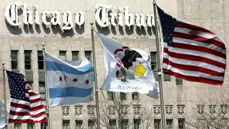 In this April 26, 2006 file photo, flags wave along Michigan Ave. Bridge outside the Chicago Tribune Tower in a Chicago. Lenders who said Monday, April 12, 2010, they are owed more than $3.6 billion by Tribune Co. are calling a purported global settlement that the media company announced last week dead on arrival.(AP Photo/Charles Rex Arbogast, File)