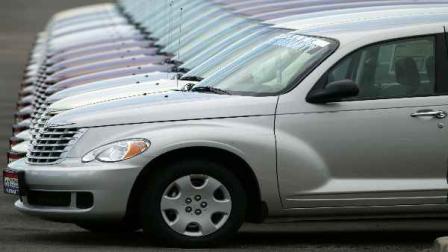 In this Aug. 26, 2007 file photo, a long row of unsold 2007 PT Cruisers sit on the lot of a Chrysler-Jeep dealership in the east Denver suburb of Aurora, Colo. Chrysler ended production of the PT Cruiser Friday, July 9, 2010, a decade after the retro-styled wagon roared onto the road with its trend-setting looks and Al Capone swagger. Chrysler could barely keep up with demand in 2001, the vehicles peak year, when it sold 144,717. But its been in a slow decline for years; the company sold just 17,941 PT Cruisers last year. (AP Photo/David Zalubowski, File)