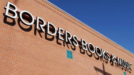 FILE - In this file photo made March 31, 2009, a Borders Books & Music sign is displayed at the bookstore in Peabody, Mass.