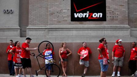 Verizon workers picket outside one of the companys central offices Monday, Aug. 8, 2011, in Philadelphia. Forty-five thousand Verizon Communications Inc. workers from Massachusetts to Washington, D.C., went on strike Sunday after negotiations fizzled over a new labor contract for more than a fifth of the companys work force. (AP Photo/Matt Rourke)