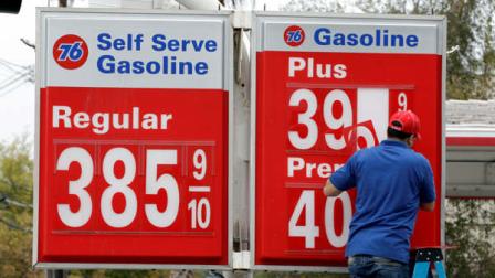 Mohammad Rezaie changes the gas prices at his Union 76 gas station in Oakland, Calif., Friday, Nov. 11, 2011. The price of oil is flirting with $100 per barrel for the first time since the summer, as fears fade that Europes debt crisis will spread and trigger another recession. (AP Photo/Paul Sakuma)