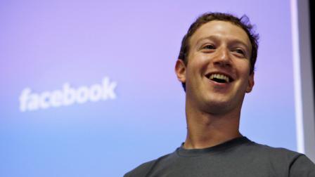 FILE - In this July 6, 2011 file photo, Facebook CEO Mark Zuckerberg smiles during an announcement at Facebook headquarters in Palo Alto, Calif. (AP Photo/Paul Sakuma, File)