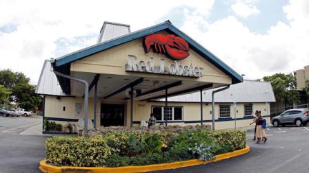 FILE - In this Thursday, Sept. 6, 2012 file photo, a Red Lobster restaurant is shown in Hialeah, Fla. The chain that brought seafood to the masses is hoping to broaden its appeal by revamping its menu on Oct. 15 to boost the number of dishes that cater to diners who dont want seafood, including lighter options such as salads. Red Lobster also is increasing the number of dishes that cost less than $15 to attract customers who have cut back on spending (AP Photo/Alan Diaz, File)