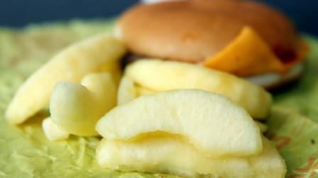 A McDonalds Cheeseburger Happy Meal with the apple slices option is shown on Tuesday, July 26, 2011 in Pittsburgh.