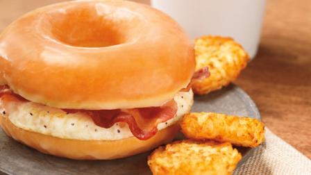 This photo provided by Dunkin Brands, Inc., shows the companys glazed donut breakfast sandwich. (AP Photo/Dunkin Brands, Inc., James Scherer)