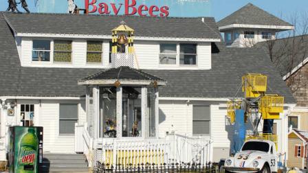 This Dec. 23, 2009 photo shows Dr. Earl B. Bradleys Office BayBees in Georgetown, Del. From the outside, Bradleys office looked like a fun place to visit: a merry-go-round and miniature Ferris wheel twirled in the yard, a statue of Buzz Lightyear perched on the roof and a purple hippo swung from a sign. Prosecutors say the doctors office complex nestled up against heavily traveled U.S. 1 in Lewes wasnt an amusement park, but a chamber of horrors where Bradley sexually abused scores of mostly female patients. Authorities say he videotaped some of the abuse in exam rooms decorated with artwork from the Disney films Pinocchio and The Little Mermaid. Bradley faces hundreds of charges when he goes on trial Wednesday, June 1, 2011, in Georgetown, Del. (AP Photo/Chuck Snyder)