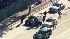 Britney Spears chased by paparazzi.