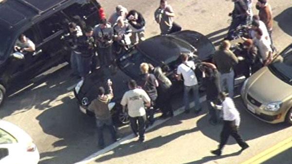 Britney Spears chased by paparazzi.
