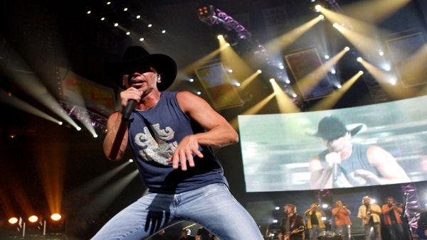 Kenny Chesney performs at Madison Square Garden Thursday, Aug. 30, 2007. (AP Photo/Jason DeCrow)