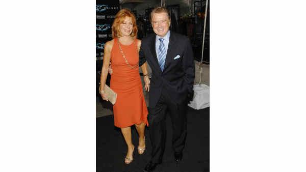 Television personalities Joy and Regis Philbin attend the world premiere of The Dark Knight at AMC Loews Lincoln Square on Monday, July 14, 2008 in New York. (AP Photo/Evan Agostini)