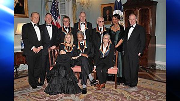 From left, Kennedy Center Honors producer George Stevens, Jr., Kennedy Center President Michael M Kiaser, Kennedy Center Honoree, Roger Daltrey, Barbara Streisand, Morgan Freeman, Pete Townshend, George Jones, Twyla Tharp, Secretary of State Condoleezza Rice, and Kennedy Center Chairman Stephen A. Schwarman pose for a group photo after the State Department Dinner for the Kennedy Center Honors gala Saturday, Dec. 6, 2008 at the State Department in Washington. (AP Photo/Kevin Wolf)
(AP)