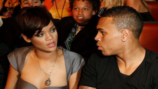 Rihanna, left, and Chris Brown are seen at the MTV Movie Awards on Sunday June 1, 2008 in Los Angeles. (AP Photo/Matt Sayles)