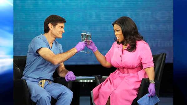 In this photo taken April 23, 2009 and provided by Harpo Productions, Inc., talk-show host Oprah Winfrey raises a champagne toast to Dr. Mehmet Oz, her in-house medical and health expert, during taping of The Oprah Winfrey Show in Chicago.