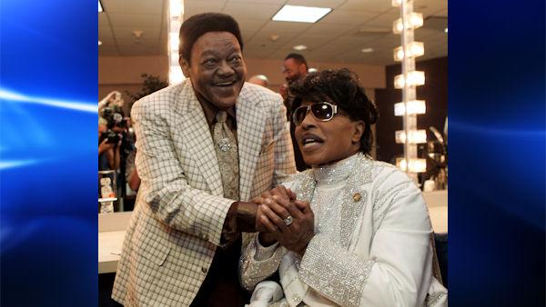Fats Domino visits with Little Richard in a dressing room after Richards performance at The Domino Effect, a tribute concert for Domino, at the New Orleans Arena in New Orleans, Saturday, May 30, 2009. A portion of the proceeds from the concert will go to New Orleans Saints quarterback Drew Brees charitable foundation, the Brees Dream Foundation, which aims to improve local playgrounds and recreation sites in New Orleans. (AP Photo/Patrick Semansky)