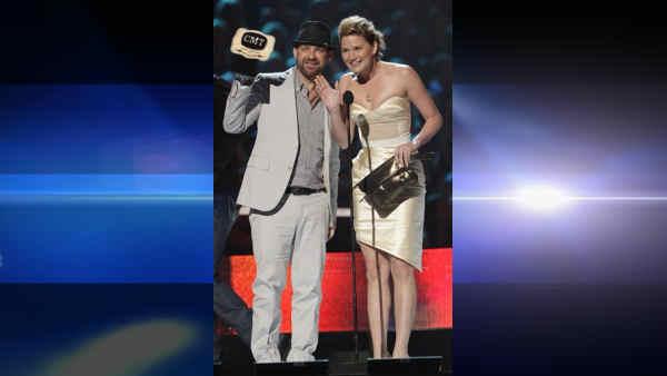 Jennifer Nettles and Kristian Bush of the band Sugarland accept the Duo of the Year Award at the CMT Music Awards in Nashville, Tenn.
Associated Press