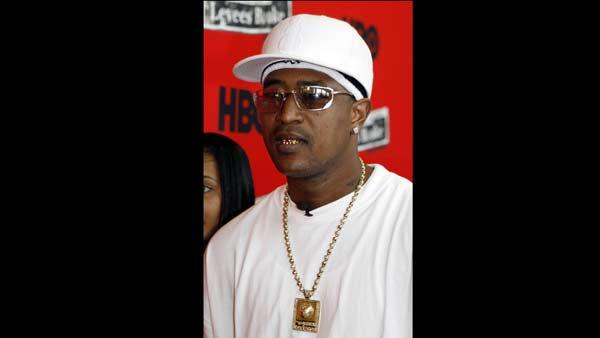 **FILE** Rapper Corey Miller, who once went by the stage name of C-Murder, arrives at the premier of Spike Lees new documentary on Katrina When The Levees Broke: A Requiem in Four Parts in New Orleans in this Aug. 16, 2006 file photo. After a month of being free to move around Jefferson and Orleans parishes during approved hours, he has been put under full house arrest. After this appearance at the premiere, Miller was ordered back into house arrest-- to await a second trial on a murder charge -- by a Louisiana judge, Tuersday, Aug. 29, 2006.(AP Photo/Alex Brandon)
