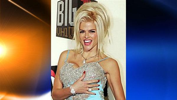 FILE - In this Dec. 1, 2004 file photo, Anna Nicole Smith poses for a photo as she arrives for the VH1 Big in 04 awards in Los Angeles. (AP Photo/Mark J. Terrill, file )
(AP