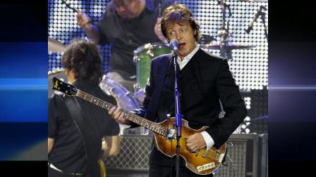 Musician Sir Paul McCartney performs at Citi Field Friday, July 17, 2009 in New York. (AP Photo/Frank Franklin II)