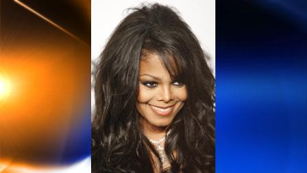 FILE - In this Sept. 28, 2009 file photo, Janet Jackson arrives for the amfAR charity dinner during the fashion week in Milan, Italy. (AP Photo/Antonio Calanni, file)