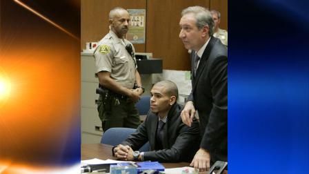 Chris Brown is seated as his attorney Mark Geragos speaks for Browns first progress report since being sentenced for beating his ex-girlfriend Rihanna, in Los Angeles Thursday, Nov. 19, 2009. (AP Photo/Gina Ferazzi, Pool)