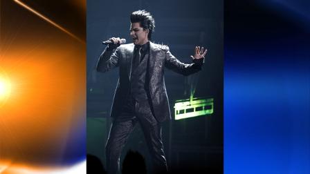 Adam Lambert performs during the closing act of the 37th Annual American Music Awards on Sunday, Nov. 22, 2009, in Los Angeles. (AP Photo/Matt Sayles)