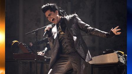 Adam Lambert, performs during the closing act of the 37th Annual American Music Awards on Sunday, Nov. 22, 2009, in Los Angeles. (AP Photo/Matt Sayles)