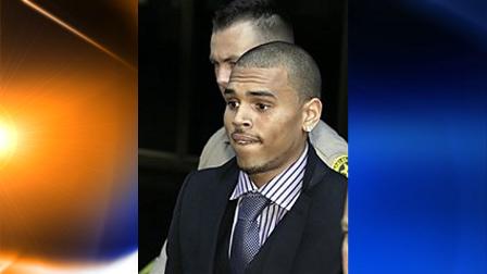 In this Nov. 19, 2009 photo, Chris Brown leaves the Criminal Justice Center after a hearing, in Los Angeles to offer a judge his first progress report since being sentenced for beating ex-girlfriend Rihanna earlier this year. ABC says Chris Brown will appear on its 20/20 newsmagazine Dec. 11. (AP Photo/Reed Saxon)
(AP)