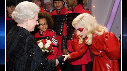 Britains Queen Elizabeth II meets American singer Lady Gaga (right) following the Royal Variety Performance in Blackpool, England Monday Dec. 7, 2009.