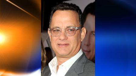 FILE - In this Nov. 9, 2009 file photo, actorTom Hanks arrives to the premiere of Old Dogs in Los Angeles. (AP Photo/Katy Winn, file)