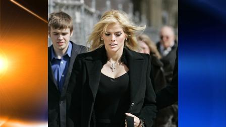 Anna Nicole Smith, leaves the Supreme Court in Washington, in this Feb. 28, 2006, file photo. With an oil fortune on the line, the former stripper encountered a sympathetic audience at the Supreme Court. (AP Photo/Manuel Balce Ceneta/FILE)