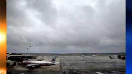 In this picture taken through a window, planes are seen parked on the tarmac at Malpensa airport, on the outskirts of Milan, Italy, Sunday, April 18, 2010. Flights remained grounded in large parts of the European continent as aviation authorities report that there is no end in sight to the Icelandic volcanic ash cloud which has paralyzed air travel. (AP Photo/Luca Bruno)
