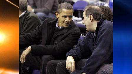 President Barack Obama talks with David Axelrod, right, senior adviser, as they watch the Georgetown Duke basketball game at the Verizon Center in Washington Saturday, Jan. 30, 2010. (AP Photo/Alex Brandon)
