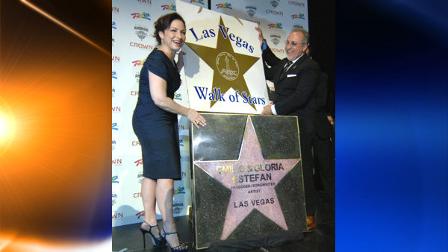 In this photo provided by the Las Vegas News Bureau, Emilio and Gloria Estefan are honored on Thursday, April 29, by the Las Vegas Walk of Stars on the Las Vegas Strip for their contributions to the Latin music industry in Las Vegas. (AP Photo/Las Vegas News Bureau, Glenn Pinkerton)