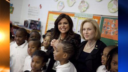 Television personality Rachael Ray, center, and Sen. Kirsten Gillibrand, D-N.Y., visit 3rd graders at Payne Elementary School to promote healthy eating, and will lobby for more child nutrition funding to combat childhood obesity on Tuesday, May 11, 2010 in Washington. (AP Photo/Evan Vucci)