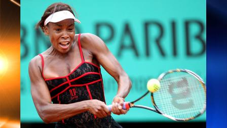 USAs Venus Williams returns the ball to Spains Arantxa Parra Santonja during their second round match of the French Open tennis tournament at the Roland Garros stadium in Paris, Wednesday, May 26, 2010. (AP Photo/Lionel Cironneau)