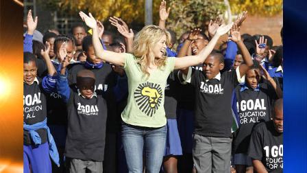 Shakira dances with kids of the Isulihle Senior Primary School in Soweto, Johannesburg, South Africa, Wednesday June 9, 2010. In anticipation of the World Cup Kick-off Celebration Concert, Shakira met with scholars and danced the Waka Waka from her official World Cup song. (AP Photo/Yves Logghe)