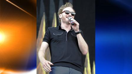 Comedian Conan OBrien appears on stage at the Bonnaroo Music and Arts Festival in Manchester, Tenn. Friday, June 11, 2010. (AP Photo/Jeff Christensen)