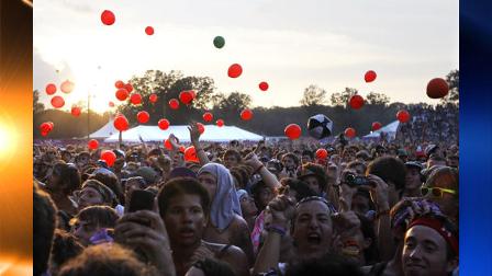 Fans listen as Phoenix performs at the Bonnaroo Music and Arts Festival on Sunday, June 13, 2010 in Manchester, Tenn. (AP Photo/Mark Humphrey)