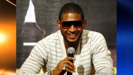 American R&B and pop singer Usher smiles during a press conference in Kuala Lumpur, Malaysia, Tuesday, July 6, 2010. (AP Photo/Lai Seng Sin)