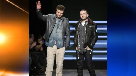FILE- This Feb. 17, 2010 file photo shows Justin Timberlake, left, and Trace Ayala as they acknowledge the audience after the William Rast fall 2010 collection show during Fashion Week in New York. William Rast, a design collaboration between Timberlake and Ayala, has a new partner: Target. (AP Photo/Jason DeCrow, FILE)