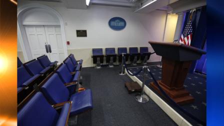 The seat of former White House correspondent Helen Thomas, left, is seen in the James Brady Press Briefing Room in the West Wing of the White House in Washington, Saturday, July 31, 2010. (AP Photo/Charles Dharapak)