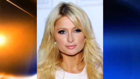 Television personality Paris Hilton arrives at the USOs Songs For Soldiers initiative event on Wednesday, May 26, 2010 in New York. (AP Photo/Evan Agostini)