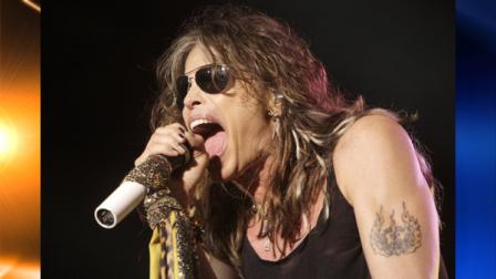 File - Vocalist Steven Tyler of the rock band Aerosmith performs at the Verizon Wireless Amphitheatre in this June 10, 2009 file photo taken in Maryland Heights, Mo. (AP Photo/Jeff Roberson, File)