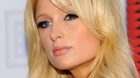 Television personality Paris Hilton arrives at the USOs Songs For Soldiers initiative event on Wednesday, May 26, 2010 in New York. (AP Photo/Evan Agostini)