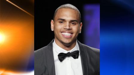 FILE - In this Feb. 12, 2010 file photo, Chris Brown models at Naomi Campbells Fashion For Relief - Haiti fashion benefit, shown during Fashion Week in New York. (AP Photo/Stuart Ramson, file)