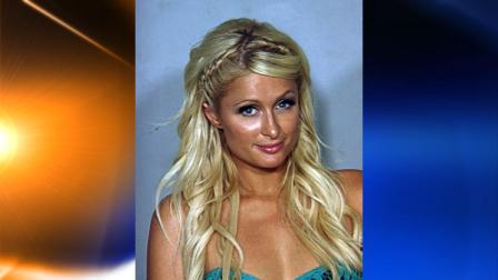 ** In this photo released Saturday, Aug. 28, 2010 by the Las Vegas Metropolitan Police Department, Paris Hilton poses for a police booking photo in Las Vegas. Paris Hilton was arrested after a police motorcycle officer smelled marijuana smoke wafting from a black Cadillac Escalade driven by her boyfriend on the Las Vegas Strip, then found cocaine in her purse, authorities said. (AP Photo/Las Vegas Metropolitan Police Department)