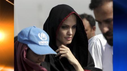 Hollywood actress and the goodwill ambassador of UNHCR, Angelina Jolie visits a camp setup for people displaced by heavy floods, in Mohib Banda near Peshawar, Pakistan on Tuesday, Sept. 7, 2010. Jolie appealed to the international community to provide aid needed to help the country recover from its worst natural disaster. (AP Photo/Mohammad Sajjad)