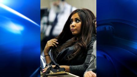Nicole Polizzi, better known as Snooki from the MTV show Jersey Shore sits in court Wednesday, Sept. 8, 2010, in Seaside Heights, N.J., waiting to face charges of being a public nuisance and annoying others on the Seaside Heights beach in July. (AP Photo/Mel Evans)