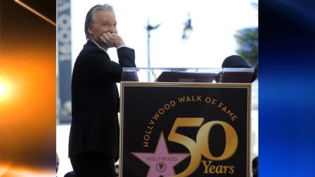 Comedian and television host Bill Maher pauses onstage during a ceremony to award him a star on the Hollywood Walk of Fame in Los Angeles, Tuesday, Sept. 14, 2010. (AP Photo/Chris Pizzello)
