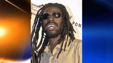 FILE - In this Oct. 13, 2003 file photo, Jamaican reggae star Buju Banton poses at the Source Hip-Hop Music Awards in Miami. On his upcoming album Before the Dawn, Banton crows about standing strong, though battered and bruised, in the face of a gathering darkness. The songs sound prophetic, as the four-time Grammy nominee recorded them before he was arrested on federal cocaine charges last December. The trial is scheduled to start Monday, Sept. 20, 2010, in Tampa, Fla., a week before the albums U.S. release. He faces a possible life sentence if convicted. (AP Photo/Yesikka Vivancos, File)